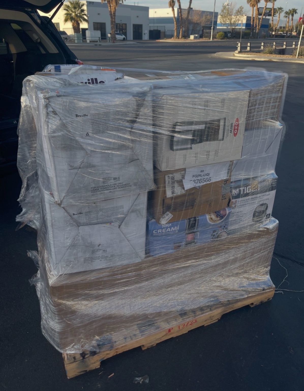 Wrapped pallet prepared for scheduled courier delivery
